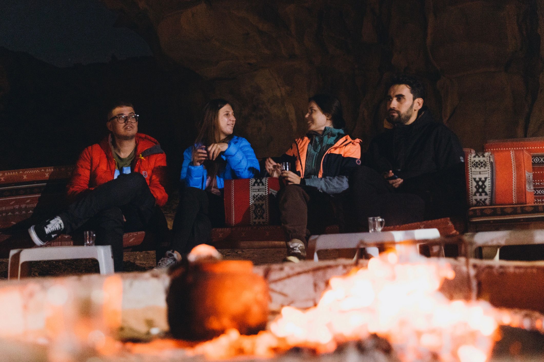 Travelers enjoying an outdoor evening during a mountain trip