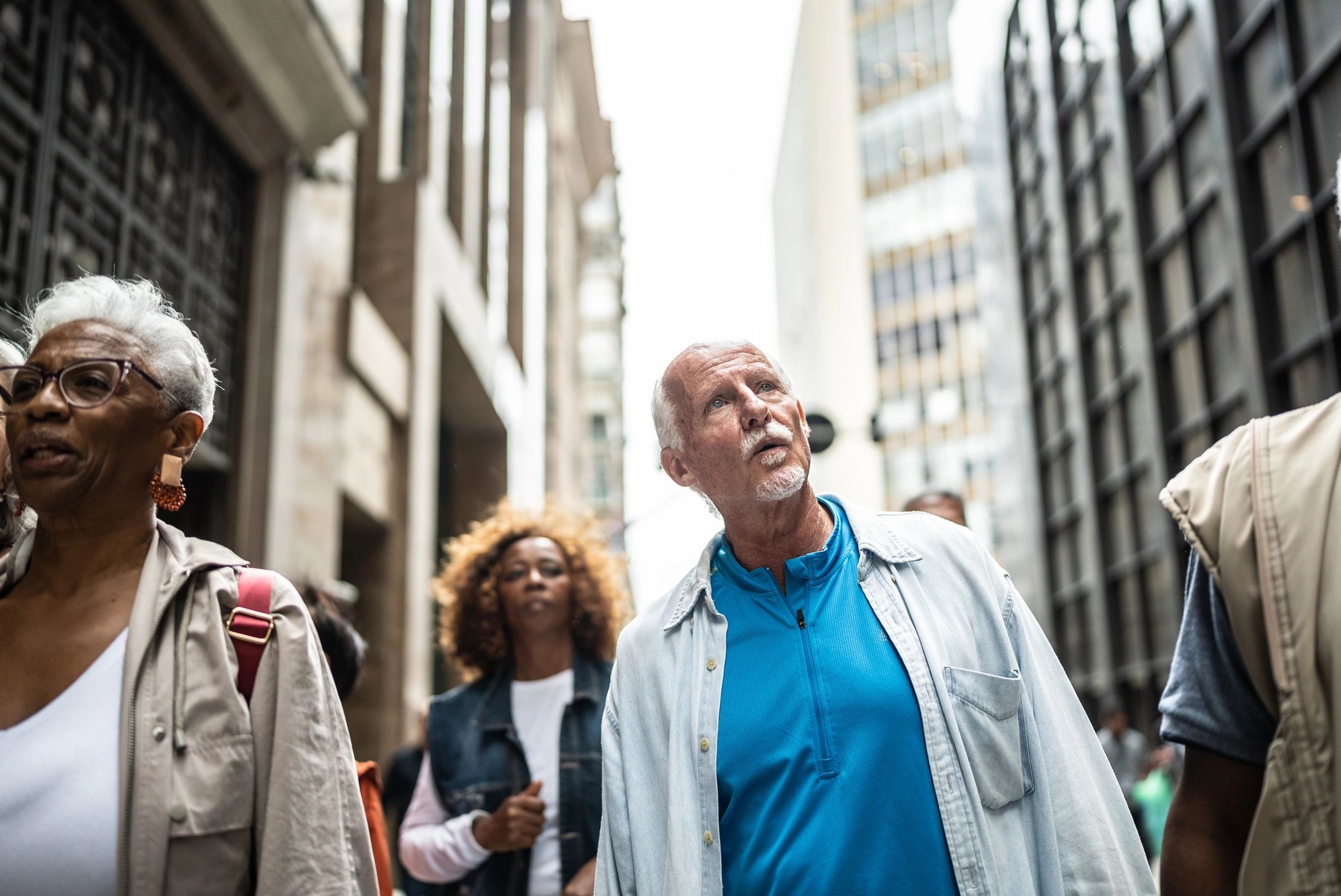 Senior tourists enjoying a scenic outdoor stop